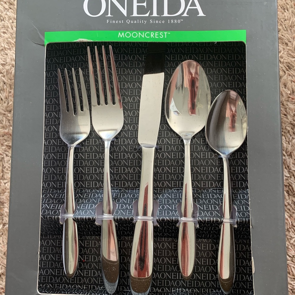 Brand new unopened Oneida moon rest silverware set